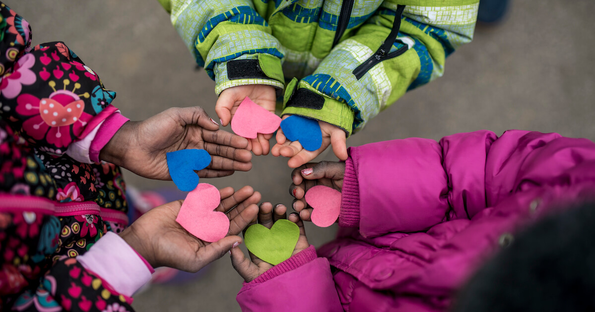 children-holding-hearts-in-hands